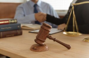 A solicitor and his client discussing how to pursue a criminal burn injury claim